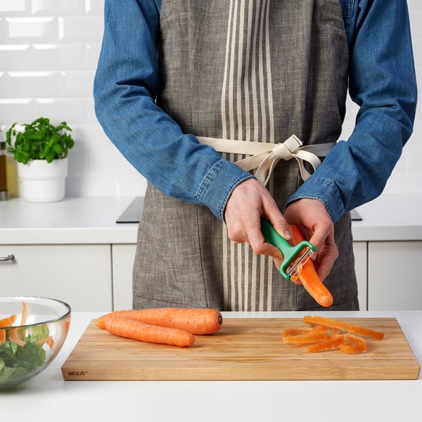 UPPFYLLD peeler, bright green