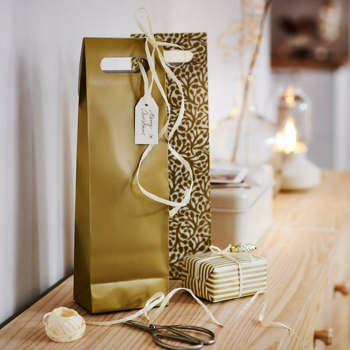 VINTERFINT gift bag for bottle, mixed patterns/gold-colour, 13x41 cm, 2 pack