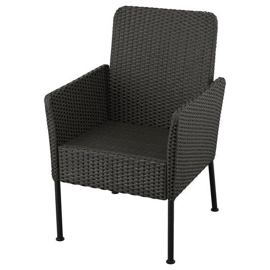 VITTSKÄR chair with armrests, plastic rattan outdoor/dark grey, 50x95x64 cm