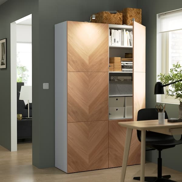 Ikea BESTÅ - Storage combination with doors, white/Hedeviken oak veneer, 120x42x193 cm