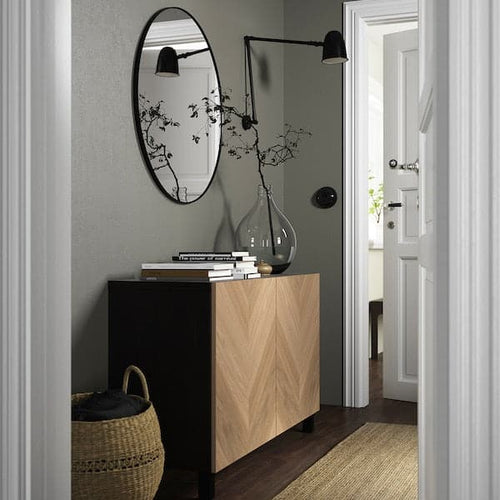 BESTÅ - Storage combination with doors, black-brown/Hedeviken/Stubbarp oak veneer, 120x42x74 cm