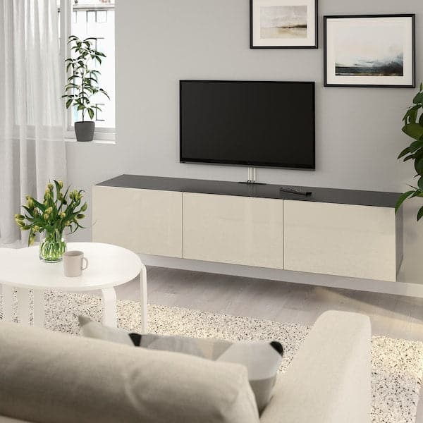 BESTÅ Mobile TV with doors - brown-black/Selsviken glossy/beige 180x42x38 cm , - best price from Maltashopper.com 09330671
