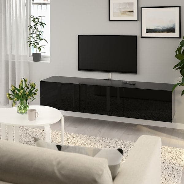 BESTÅ - TV bench with doors, black-brown/Selsviken high-gloss/black, 180x42x38 cm - best price from Maltashopper.com 69330673