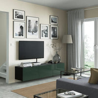 BESTÅ - TV bench with doors, black-brown/Selsviken dark olive-green, 180x42x38 cm - best price from Maltashopper.com 09422190