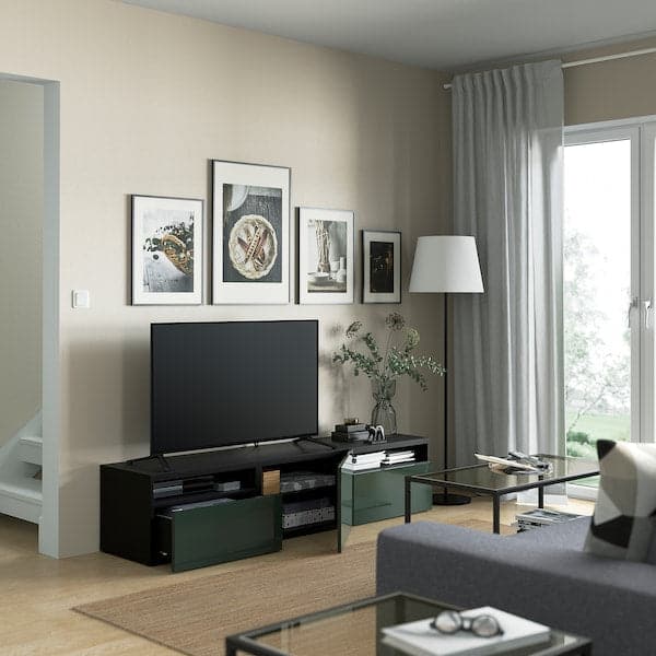 BESTÅ - TV bench with drawers and door, black-brown/Selsviken dark olive-green, 180x42x39 cm - best price from Maltashopper.com 09420313