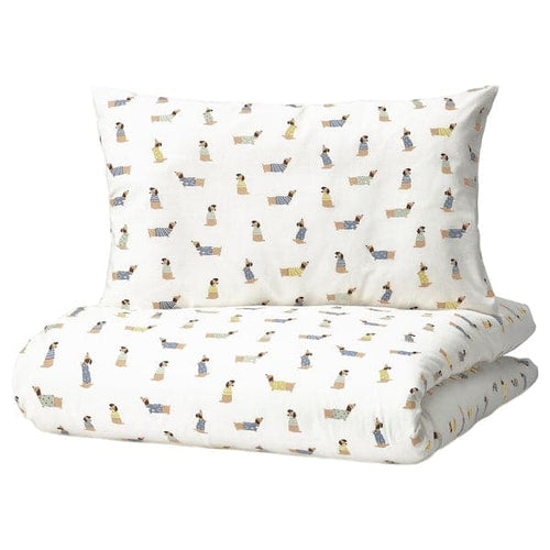 DRÖMSLOTT - Duvet cover 1 pillowcase for cot, puppy pattern/multicolour, 110x125/35x55 cm