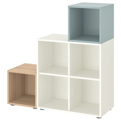 EKET - Cabinet combination with feet, white/white stained oak effect light grey-blue, 105x35x107 cm
