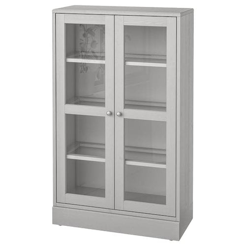 HAVSTA - Glass-door cabinet with plinth, grey/clear glass, 81x37x134 cm