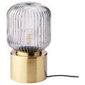 SOLKLINT table lamp, brass/grey clear glass, 28 cm