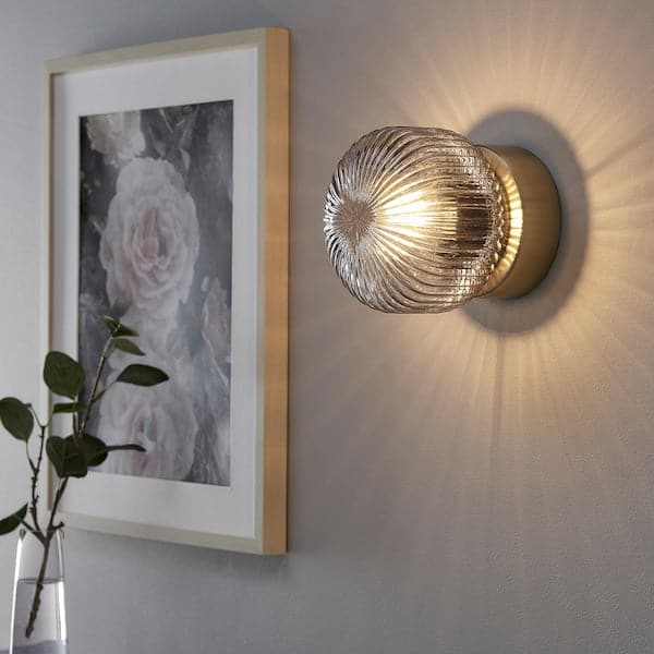 SOLKLINT - Wall lamp, wired-in installation, brass/grey clear glass - best price from Maltashopper.com 30472022