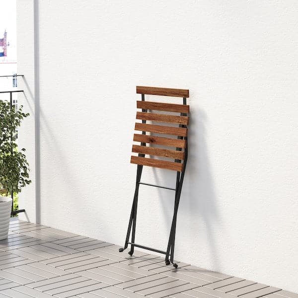 TÄRNÖ - Chair, outdoor, foldable black/light brown stained - best price from Maltashopper.com 90095428