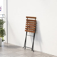 TÄRNÖ - Table+4 chairs, outdoor, black/light brown stained - best price from Maltashopper.com 29393709