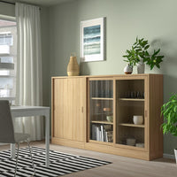 TONSTAD - Storage combination w sliding doors, oak veneer/clear glass, 202x37x120 cm