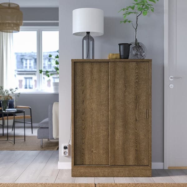 TONSTAD - Cabinet with sliding doors, brown stained oak veneer, 82x37x120 cm - best price from Maltashopper.com 30489230