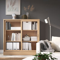 TONSTAD - Cabinet with sliding glass doors, oak veneer, 121x37x120 cm